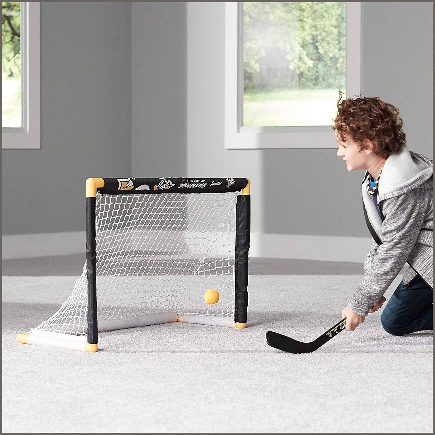 Franklin Sports NHL Kids Mini Hockey Goal + Sticks Set -36